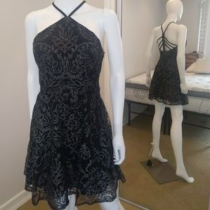 Black dress with tulle and glittered silver design